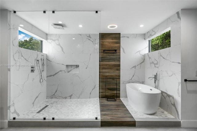 6695 SW 112th St, Pinecrest, FL 33156 - full bath featuring a marble finish shower, a freestanding tub, recessed lighting, plenty of natural light, and stone wall