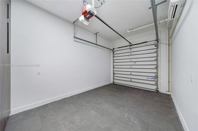 6695 SW 112th St, Pinecrest, FL 33156 - garage with baseboards and a garage door opener