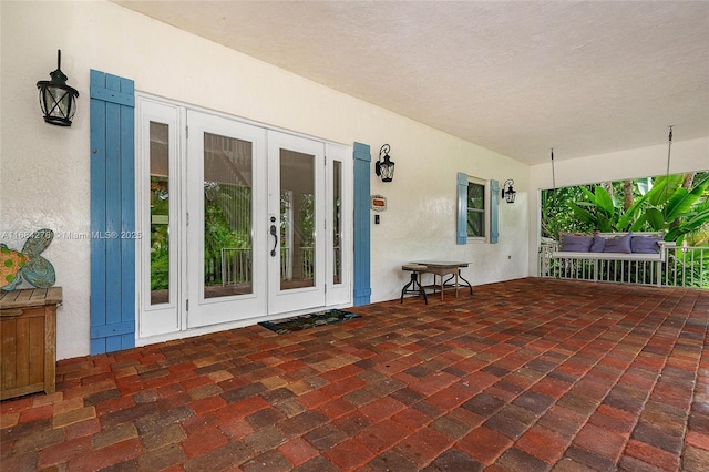 view of patio / terrace featuring french doors