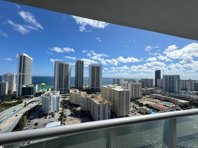 property's view of city featuring a water view