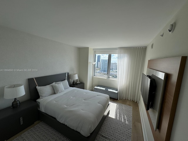 bedroom featuring hardwood / wood-style flooring