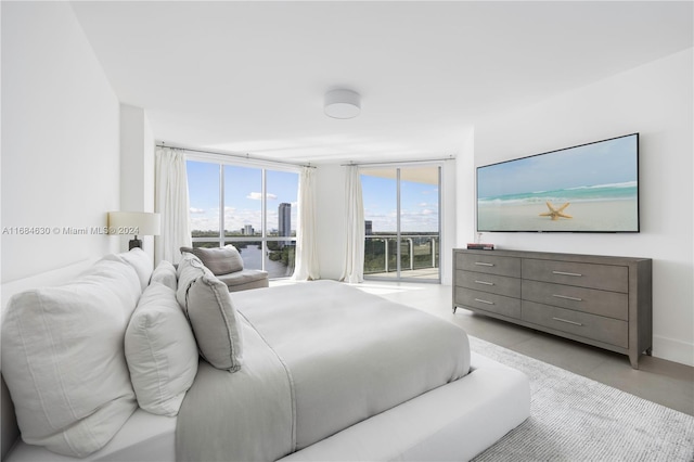 bedroom with expansive windows