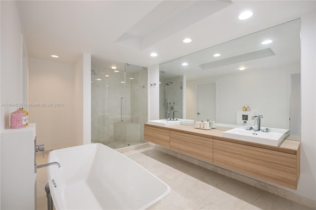 bathroom with tile patterned flooring, vanity, and independent shower and bath