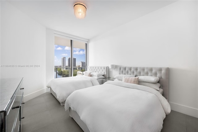 bedroom with floor to ceiling windows