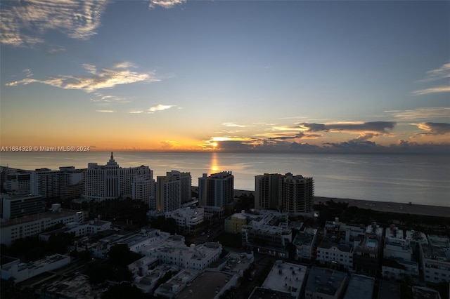 property's view of city with a water view