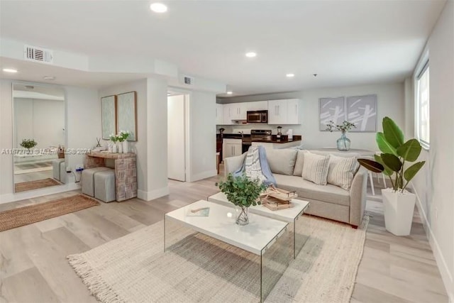 living room featuring light hardwood / wood-style flooring