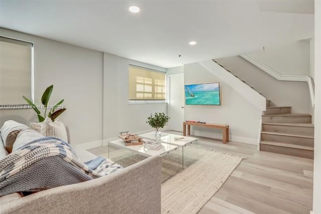 living room with light hardwood / wood-style floors