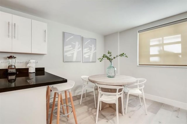 dining room featuring light wood-type flooring