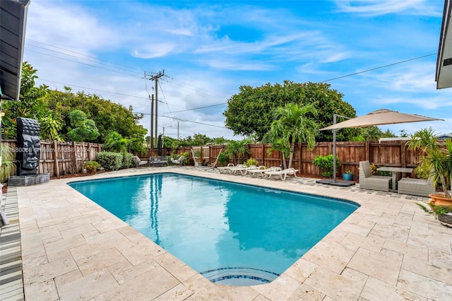 view of pool with a patio area