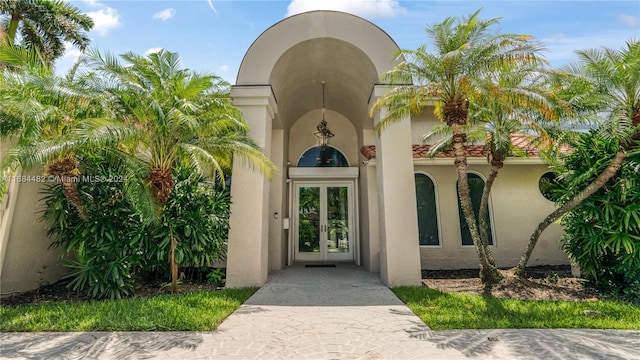 doorway to property featuring french doors