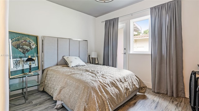 bedroom featuring light hardwood / wood-style flooring