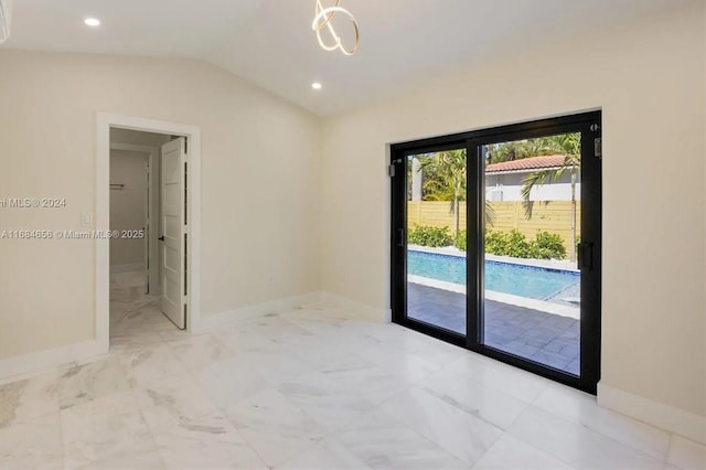 spare room with vaulted ceiling, marble finish floor, recessed lighting, and baseboards