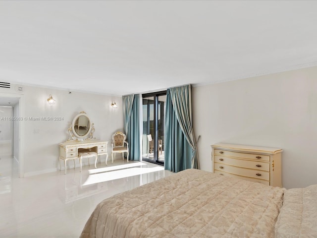 bedroom featuring access to outside and light tile patterned floors