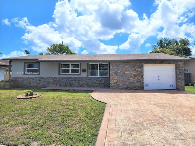 ranch-style house with a front lawn and a garage