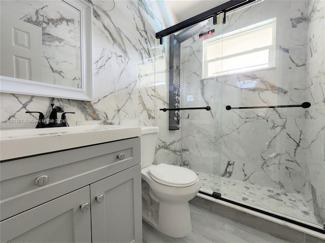 bathroom with toilet, vanity, walk in shower, tile walls, and tasteful backsplash