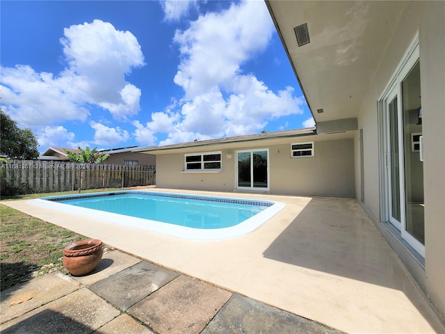 view of pool with a patio area