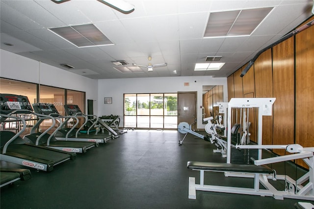 workout area with a paneled ceiling