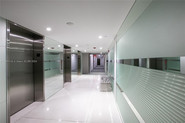 hallway featuring elevator