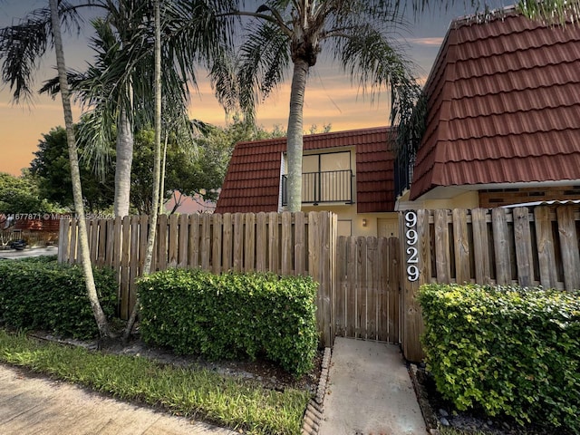 view of property exterior at dusk