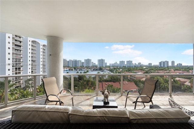 3600 Yacht Club Dr Unit 803, Aventura, FL 33180 - balcony with outdoor lounge area and a view of city