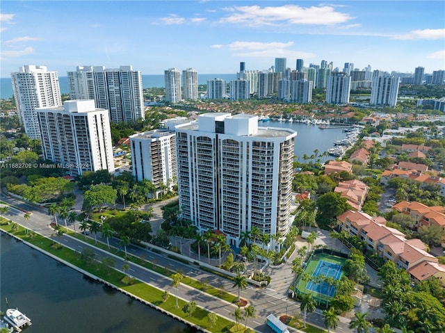 birds eye view of property featuring a water view