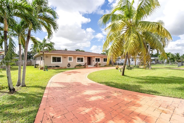 view of front of home with a front lawn