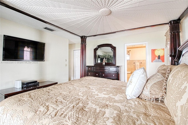 bedroom featuring ensuite bath