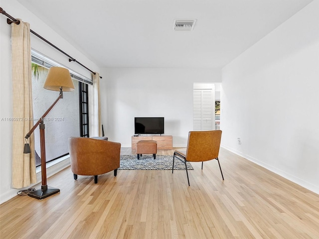 living area featuring light hardwood / wood-style flooring