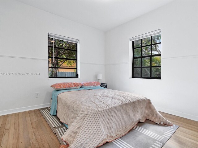 bedroom featuring light wood-type flooring