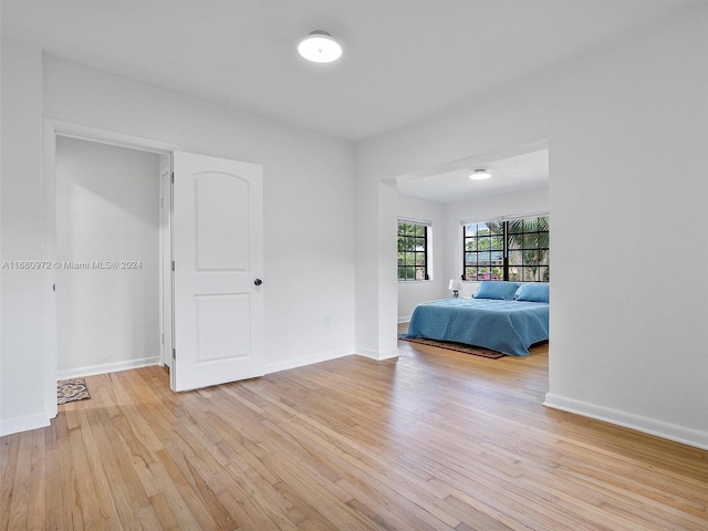 unfurnished bedroom with light hardwood / wood-style flooring