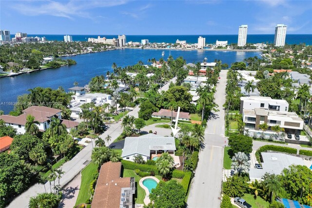 birds eye view of property featuring a water view