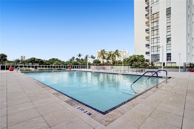 view of pool featuring a patio area