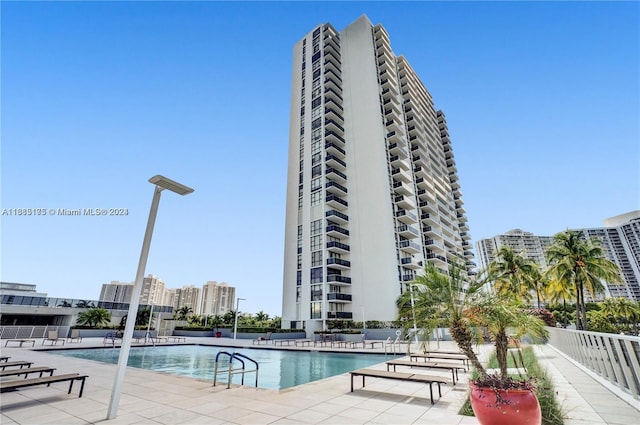 view of swimming pool with a patio area