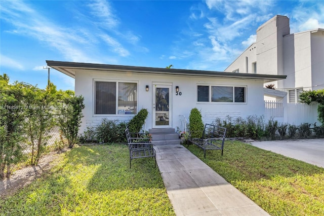 view of front of property with a front yard