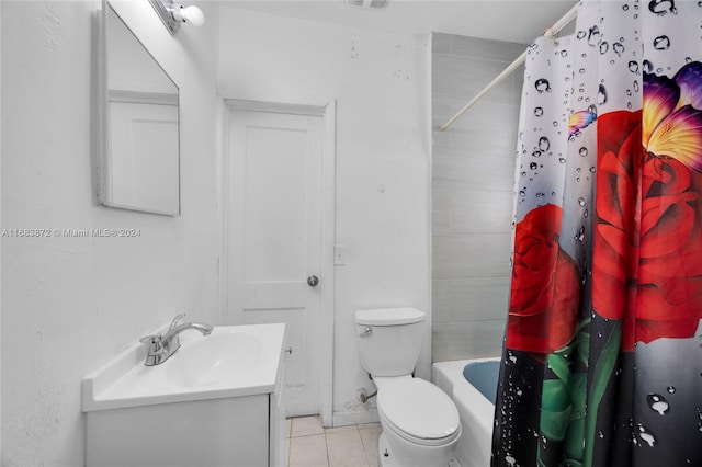 full bathroom featuring vanity, shower / bath combo, toilet, and tile patterned floors