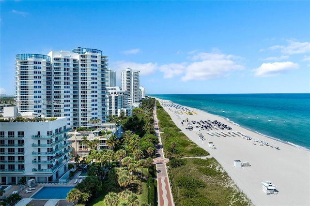 aerial view with a view of the beach and a water view