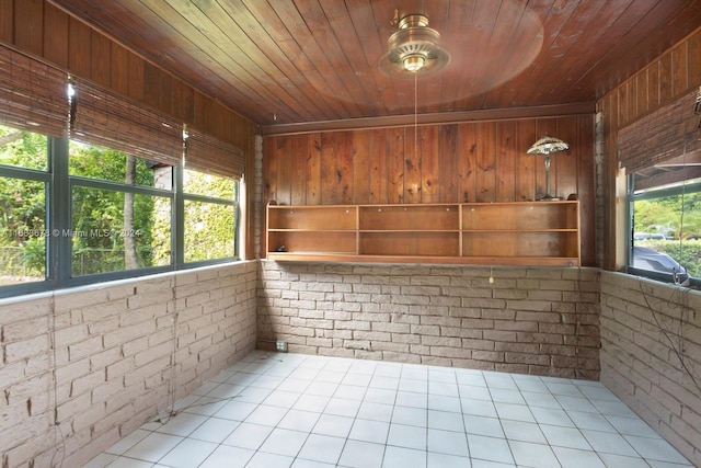 interior space featuring wooden ceiling