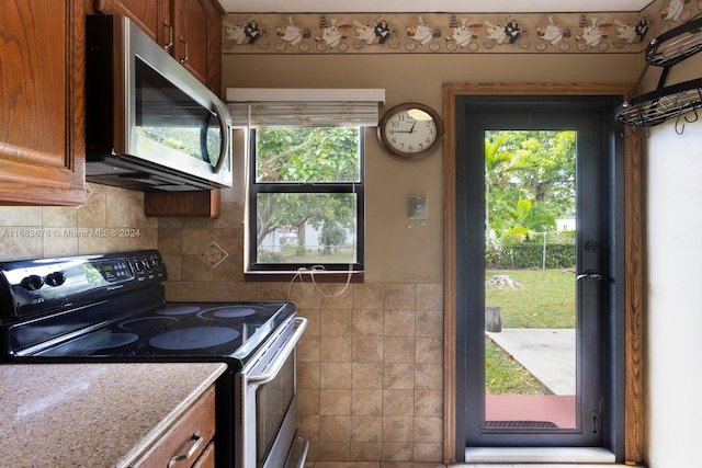 kitchen with range with electric cooktop