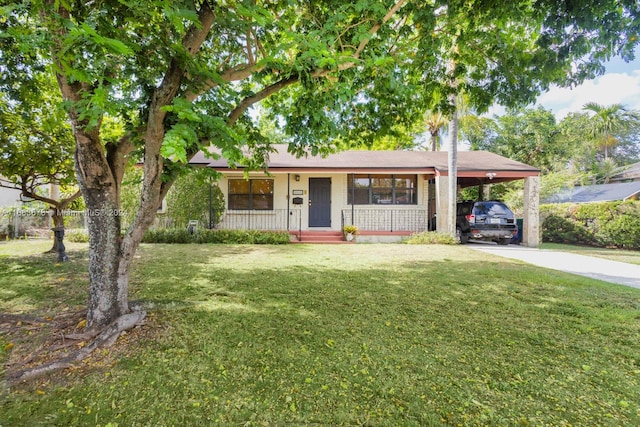 single story home featuring a front yard, a porch, and a carport