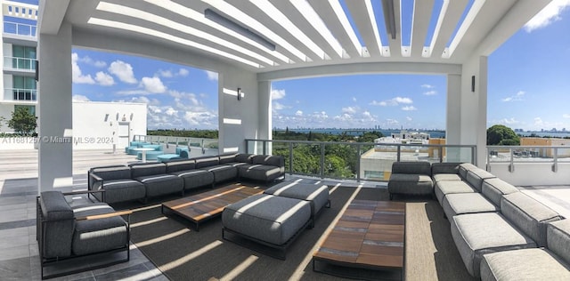 view of patio / terrace with a balcony