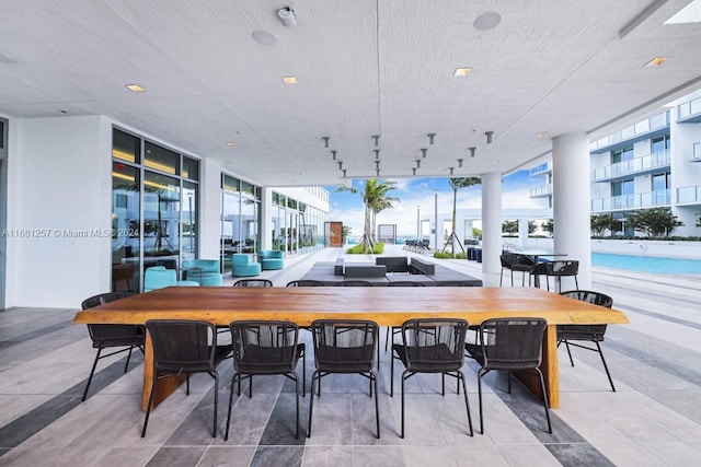 dining room featuring expansive windows