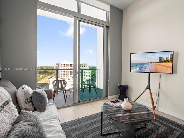 3900 Biscayne Blvd Unit N-1211, Miami, FL 33137 - living area with floor to ceiling windows and baseboards