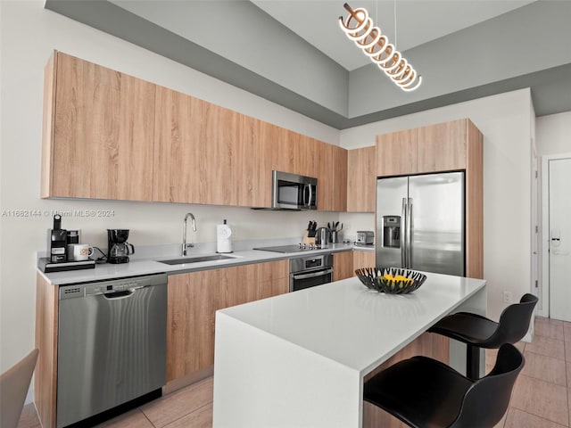 3900 Biscayne Blvd Unit N-1211, Miami, FL 33137 - kitchen featuring appliances with stainless steel finishes, a sink, and modern cabinets