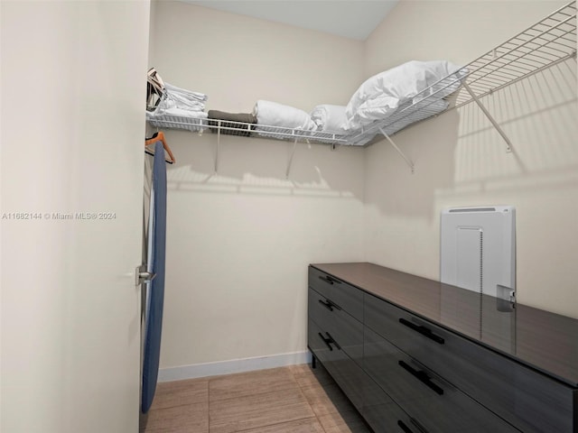 3900 Biscayne Blvd Unit N-1211, Miami, FL 33137 - spacious closet featuring light tile patterned floors