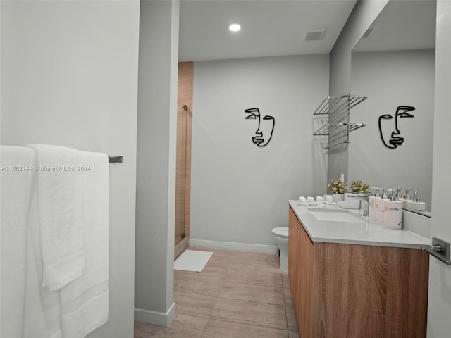 3900 Biscayne Blvd Unit N-1211, Miami, FL 33137 - full bath featuring vanity, a stall shower, toilet, baseboards, and recessed lighting