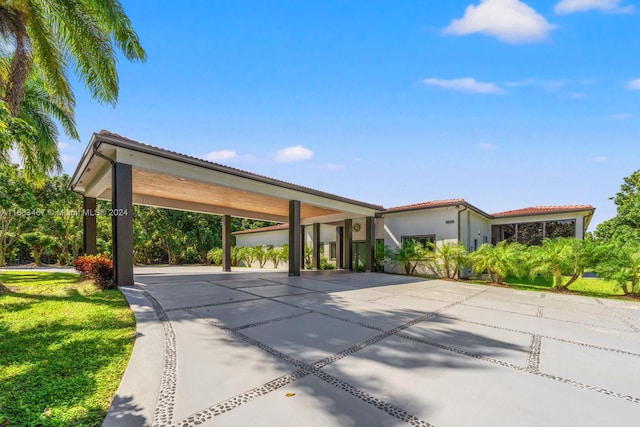 exterior space featuring a carport