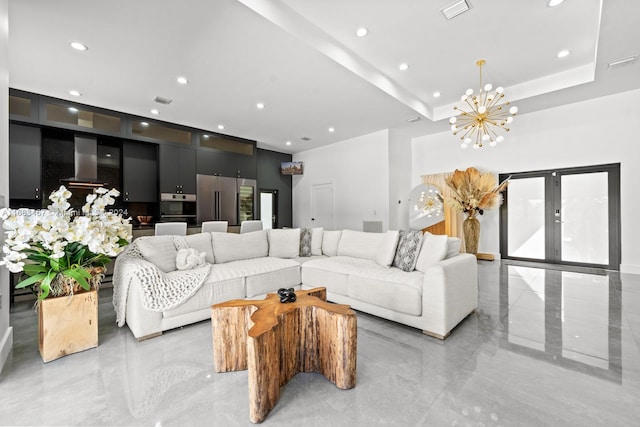 living room featuring an inviting chandelier