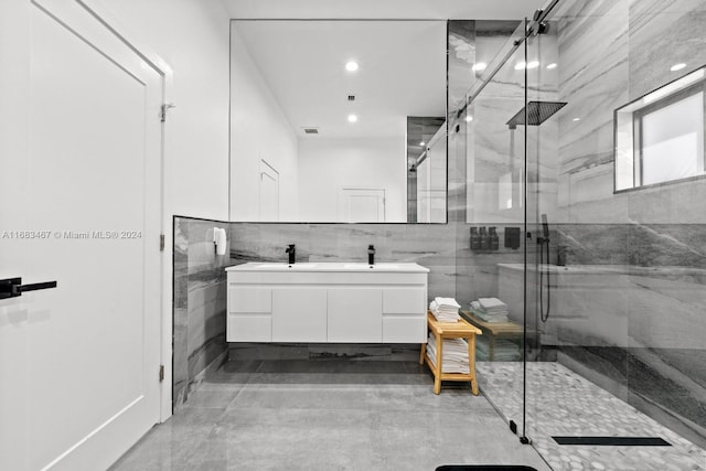 bathroom with vanity and an enclosed shower