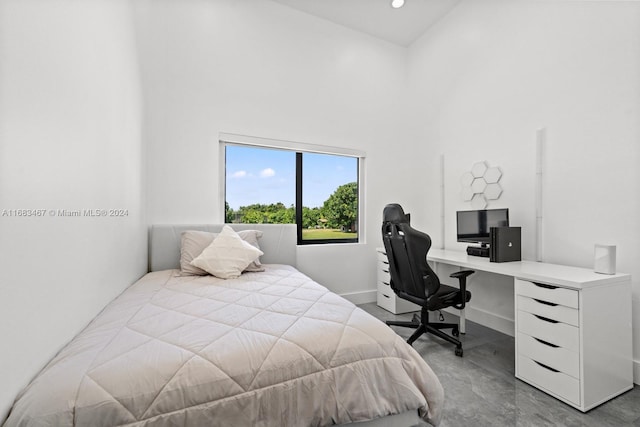 bedroom with a high ceiling