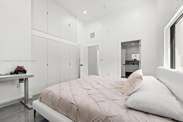 bedroom with a high ceiling